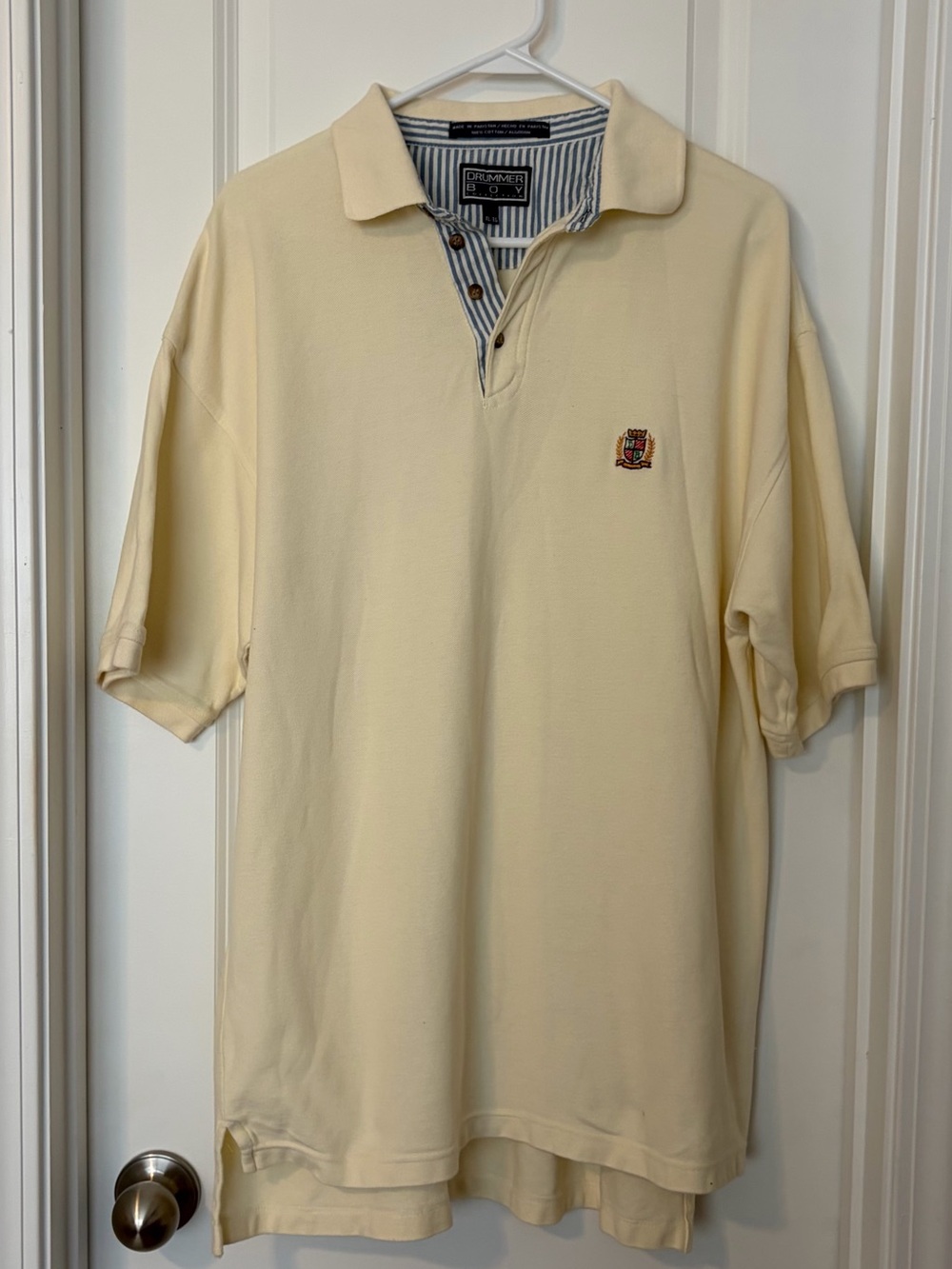 Drummer Boy Cream Polo Shirt with Embroidered Crest by Chaps
Size XL